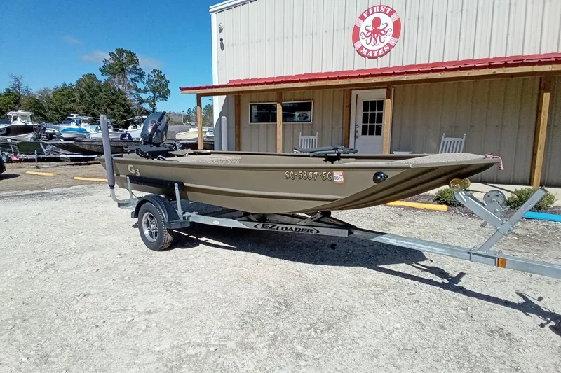 Slide: The Image of 2024 G3 Gator Tough 1652 VBW boat on trailer outside dealership. - 4
