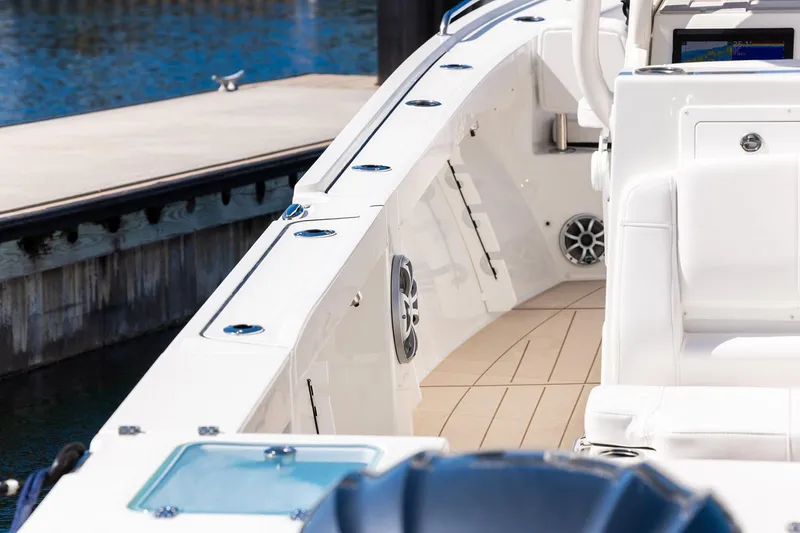 Slide: The Image of Manufacturer Provided Image: 2026 Parker 294 Fathom boat interior with sleek white seating and modern design. - 9