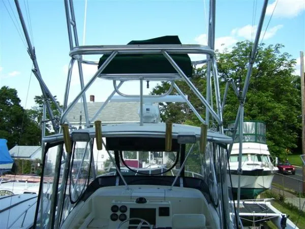 Slide: The Image of Pursuit 2870 Offshore with factory tower 1999 - 2