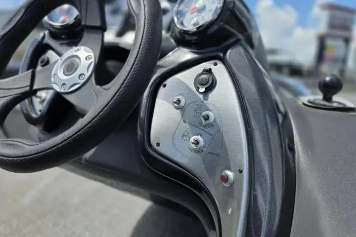 Slide: The Image of 2020 Tracker Pro Team 175 TF dashboard with steering wheel and control panel. - 17