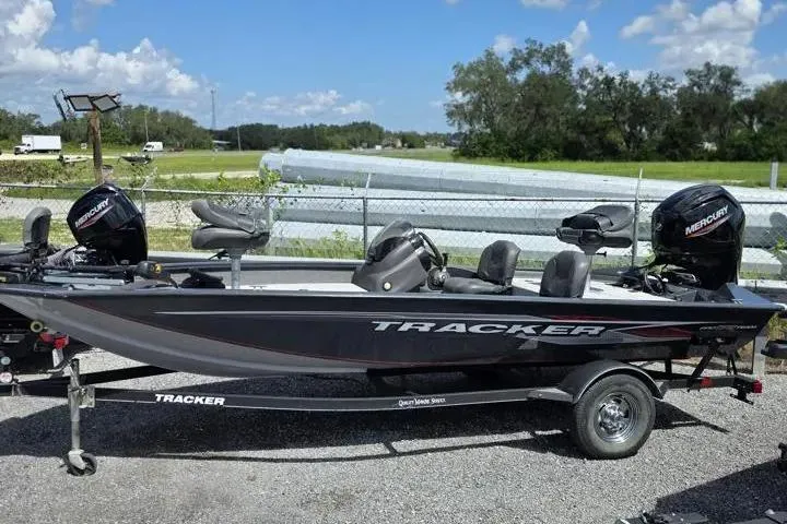 Slide: The Image of 2020 Tracker Pro Team 175 TF fishing boat on trailer, parked outdoors. - 3