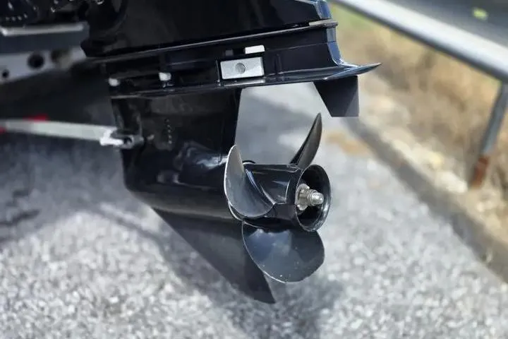 Slide: The Image of Propeller of 2020 Tracker Pro Team 175 TF boat on pavement background. - 6