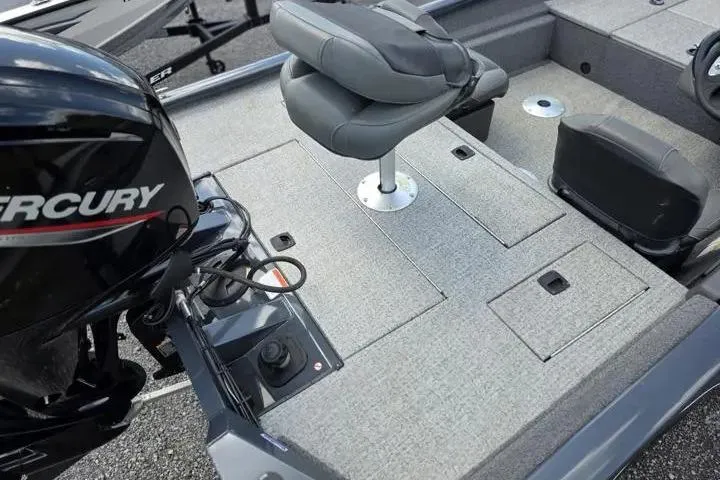 Slide: The Image of 2020 Tracker Pro Team 175 TF boat interior with Mercury engine and seating. - 9