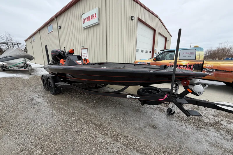 Slide: The Image of 2023 Blazer 650 Pro Tour boat on trailer outside Yamaha dealership. - 3