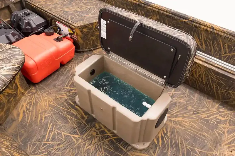 Slide: The Image of Manufacturer Provided Image: 2026 G3 Gator Tough 16 FL boat interior with open livewell and camo design. - 4