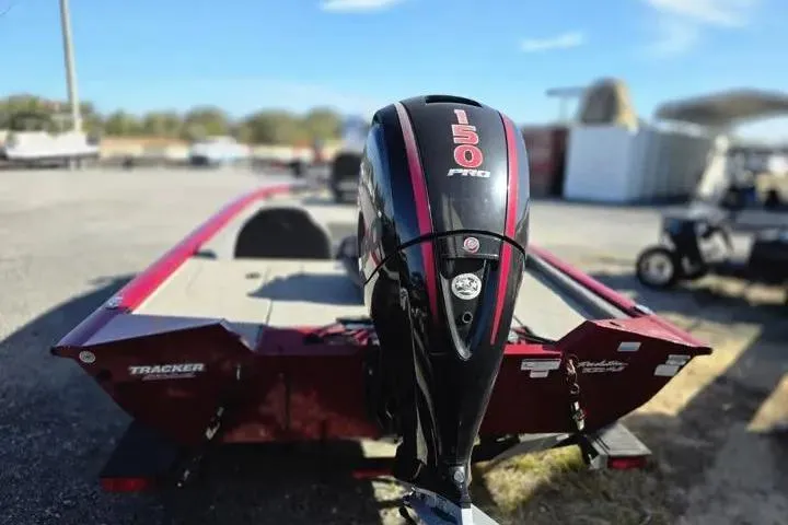 Slide: The Image of 2021 Tracker Pro Team 195 TXW Tournament Edition boat with powerful 150 Pro engine. - 10
