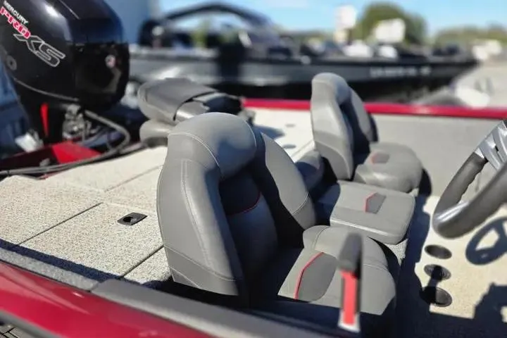 Slide: The Image of 2021 Tracker Pro Team 195 TXW Tournament Edition boat interior with gray seating. - 18