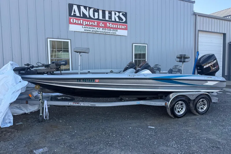 The Image of 2012 Triton 21HP boat on trailer at Anglers Outpost & Marine, Lancaster, KY. - 1
