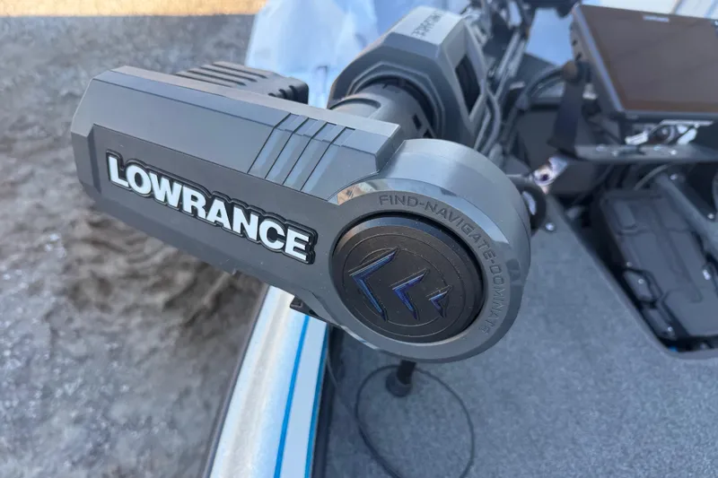 Slide: The Image of Lowrance device on 2012 Triton 21HP boat, featuring navigation technology. - 7