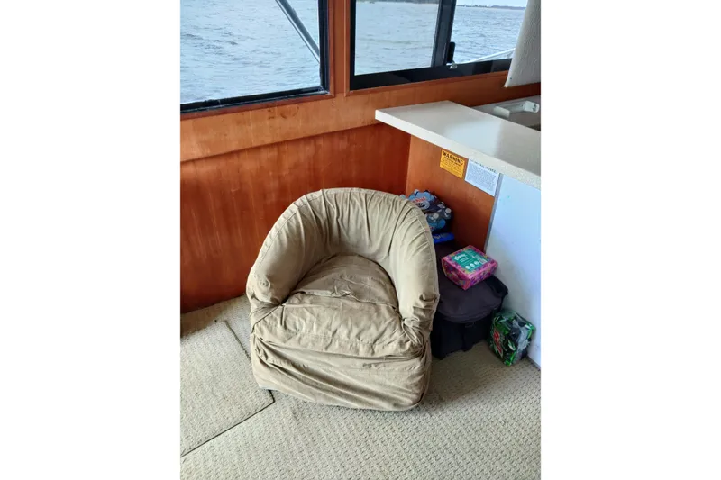 Slide: The Image of Cozy seating area on 1999 Viking 45 Convertible yacht with ocean view. - 42