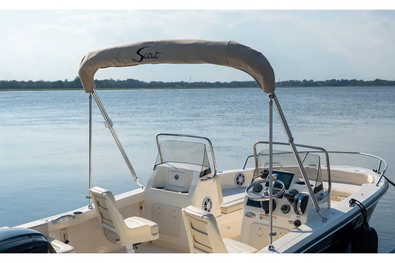 Slide: The Image of Manufacturer Provided Image: 2026 Scout 188 Sport Dorado boat on calm water, featuring sleek design and modern controls. - 7