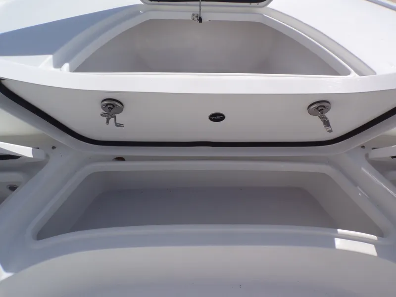 Slide: The Image of Open storage compartment of Tidewater 2500 Carolina Bay 2026 boat. - 28