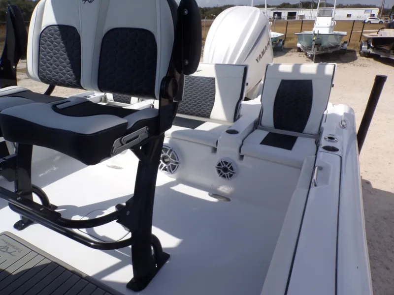 Slide: The Image of 2026 Tidewater 2500 Carolina Bay boat interior with seating. - 31