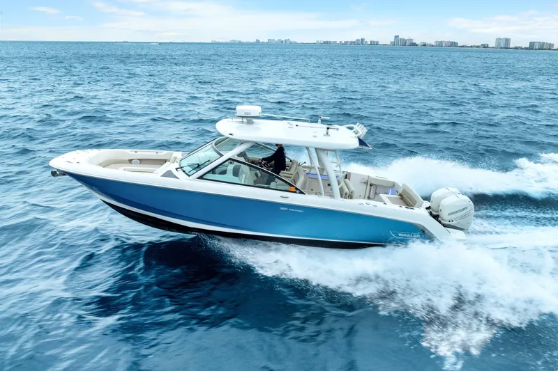 The Image of 2018 Boston Whaler 320 Vantage cruising on open ocean waters. - 0