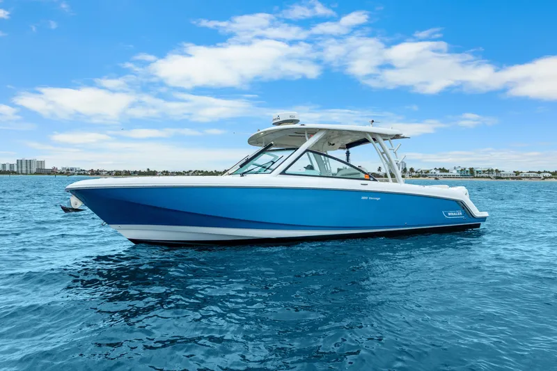 Slide: The Image of 2018 Boston Whaler 320 Vantage boat on blue ocean under clear sky. - 15