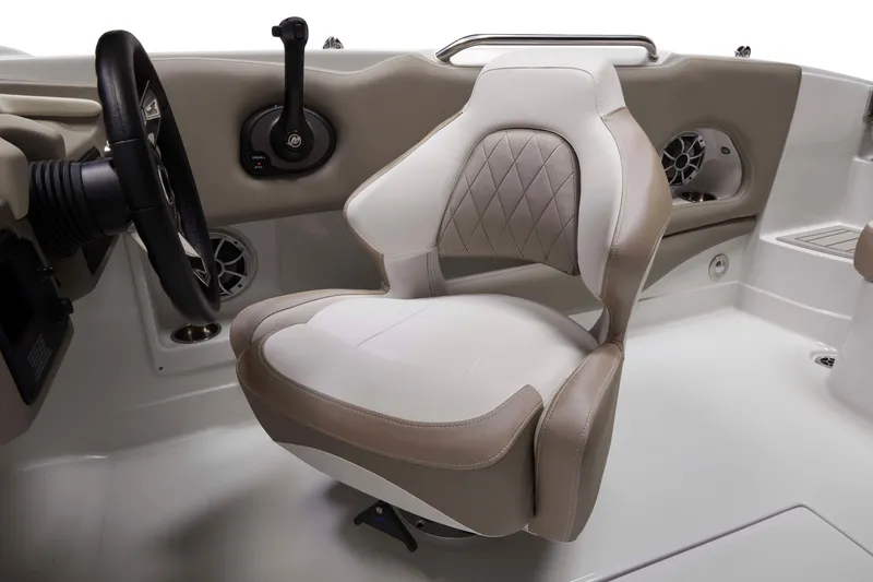 Slide: The Image of 2024 Crownline Eclipse E210 XS boat interior with luxurious captain's seat and steering controls. - 8