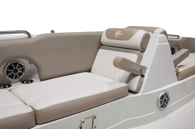 Slide: The Image of 2024 Crownline Eclipse E210 XS boat interior with beige and white seating. - 9