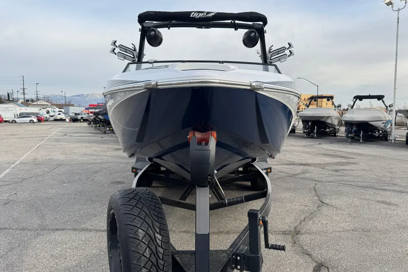 Slide: The Image of 2022 Tigé Z3 boat on trailer in parking lot, front view. - 2
