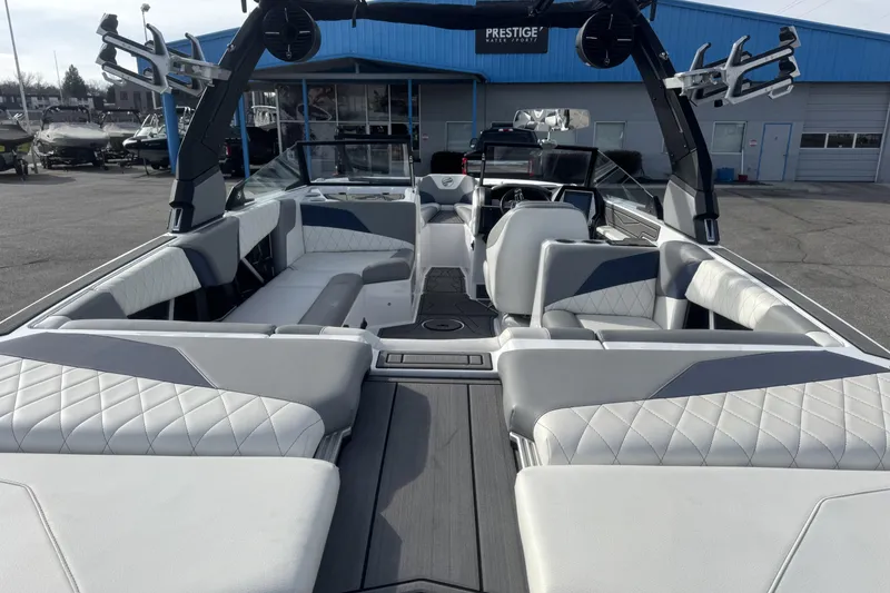 Slide: The Image of 2022 Tigé Z3 boat interior with luxurious seating and modern design. - 6