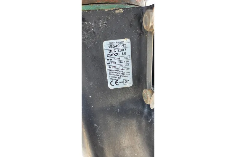 Slide: The Image of Label on 2008 Pro-Line 24 Super Sport, detailing engine specifications and serial number. - 14