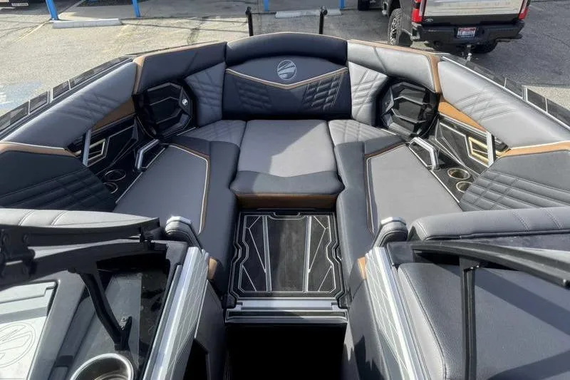 Slide: The Image of 2025 Tigé Ultré 25ZX boat interior with luxurious seating and modern design. - 12