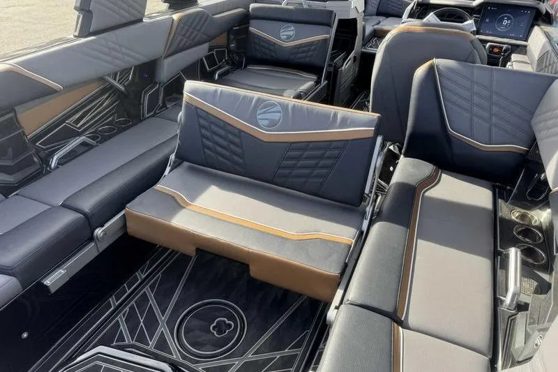 Slide: The Image of 2025 Tigé Ultré 25ZX interior with luxurious seating and modern design. - 15