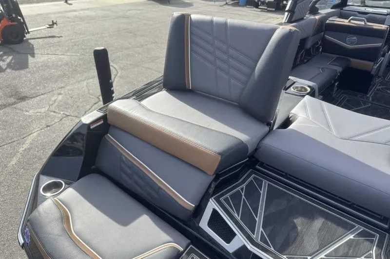 Slide: The Image of 2025 Tigé Ultré 25ZX boat interior with luxurious seating and modern design. - 3