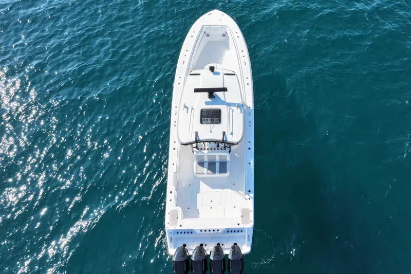 Slide: The Image of Aerial view of 2026 Blackwater 41 Sportfish boat on blue ocean water. - 24