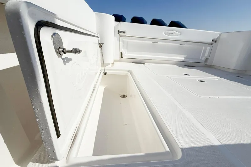 Slide: The Image of 2026 Blackwater 41 Sportfish boat deck with open storage compartments. - 29