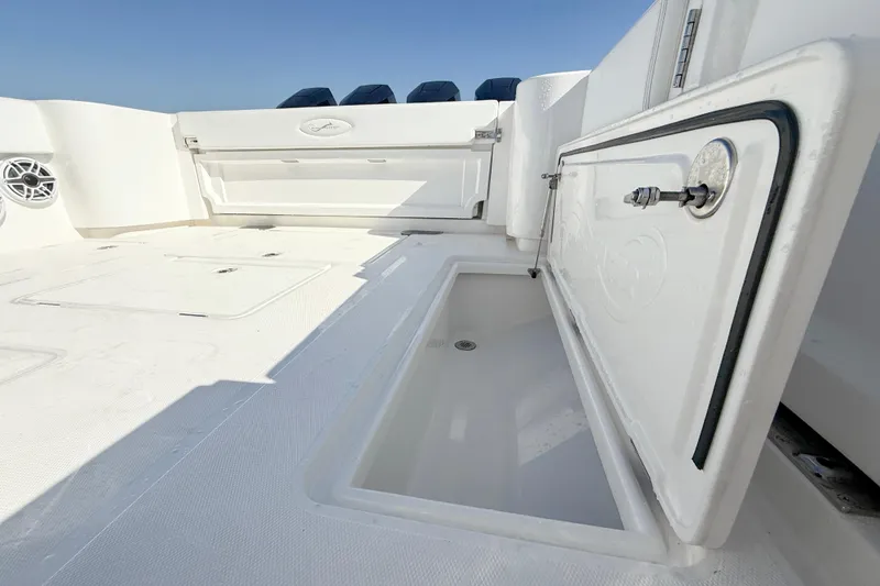 Slide: The Image of 2026 Blackwater 41 Sportfish boat deck with open storage compartment. - 30
