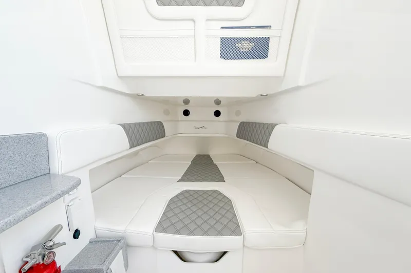 Slide: The Image of Luxurious interior of 2026 Blackwater 41 Sportfish boat with white and gray seating. - 39