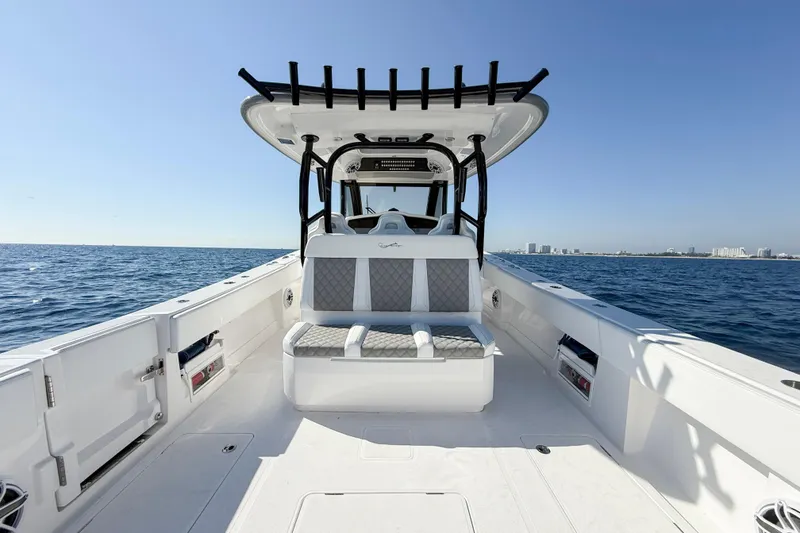Slide: The Image of 2026 Blackwater 41 Sportfish boat on open water, featuring sleek design and spacious seating. - 51