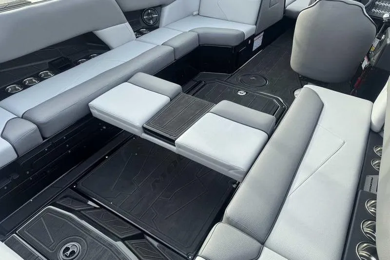 Slide: The Image of 2026 Moomba Tykon boat interior with sleek seating and modern design. - 14