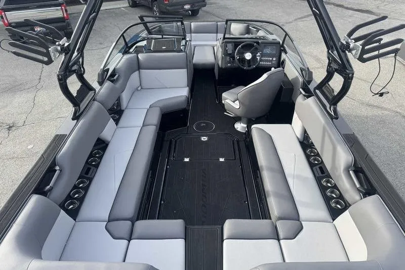 Slide: The Image of 2026 Moomba Tykon boat interior with spacious seating and modern design. - 4