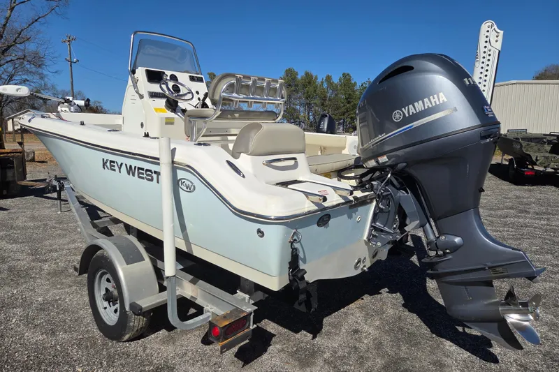 Slide: The Image of 2021 Key West 189 FS boat with Yamaha outboard motor on trailer. - 6
