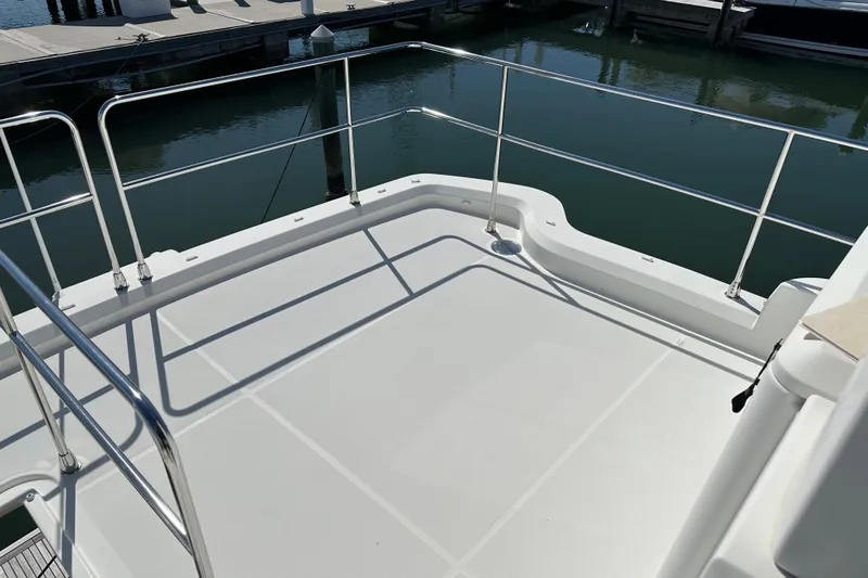Slide: The Image of Flybridge deck of 2021 Beneteau Swift Trawler 41 Fly, featuring sleek railings. - 11