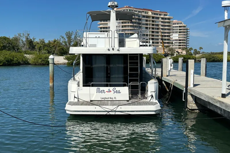 Slide: The Image of 2021 Beneteau Swift Trawler 41 Fly docked at Longboat Key, Florida marina. - 29