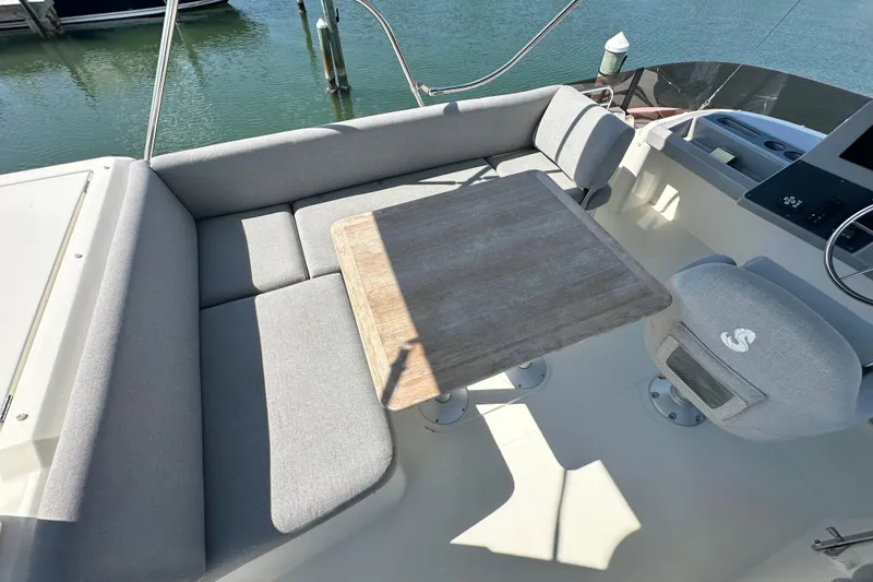 Slide: The Image of 2021 Beneteau Swift Trawler 41 Fly helm with modern controls and comfortable seating. - 4