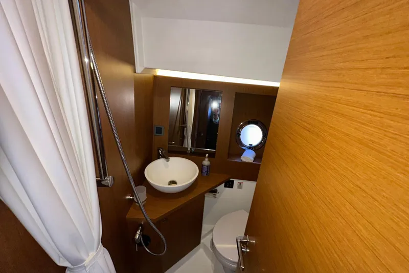 Slide: The Image of Bathroom interior of 2021 Beneteau Swift Trawler 41 Fly with modern fixtures. - 53