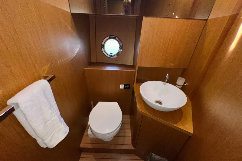 Slide: The Image of Bathroom interior of 2021 Beneteau Swift Trawler 41 Fly with wooden finish. - 59