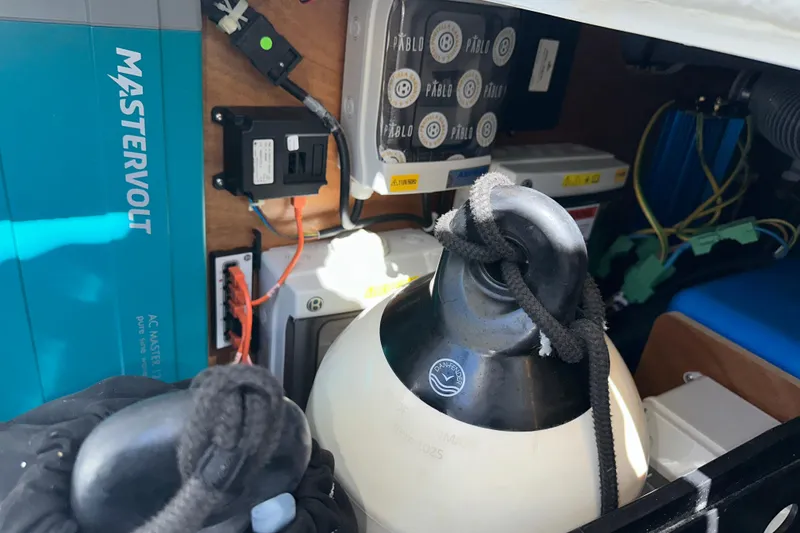 Slide: The Image of Electrical setup inside a 2021 Beneteau Swift Trawler 41 Fly, featuring Mastervolt equipment. - 65