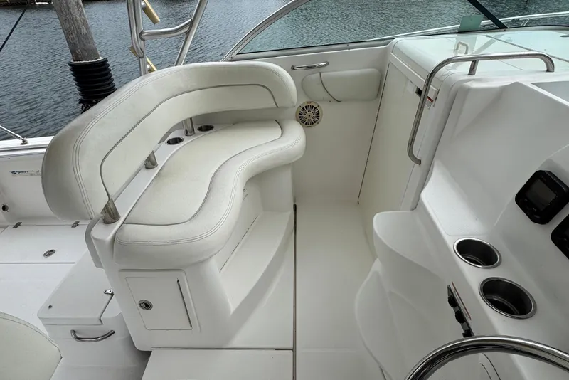 Slide: The Image of Interior of a 2008 Wellcraft 290 Coastal boat with white seating. - 5
