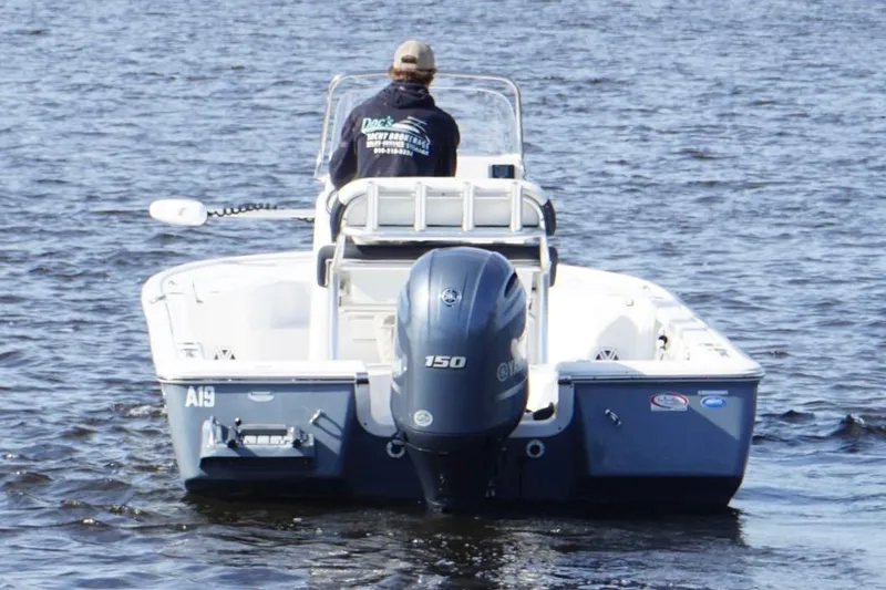 Slide: The Image of 2022 Tidewater 2110 Bay Max boat on water, rear view with Yamaha engine. - 5