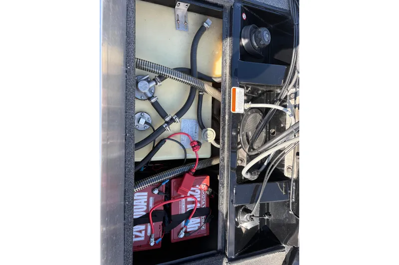 Slide: The Image of 2017 Tracker Pro Team 175 TXW boat battery compartment with wiring and components. - 15