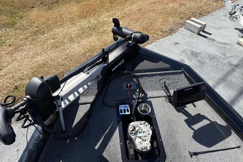 Slide: The Image of 2017 Tracker Pro Team 175 TXW boat deck with Minn Kota trolling motor and Humminbird fish finder. - 5