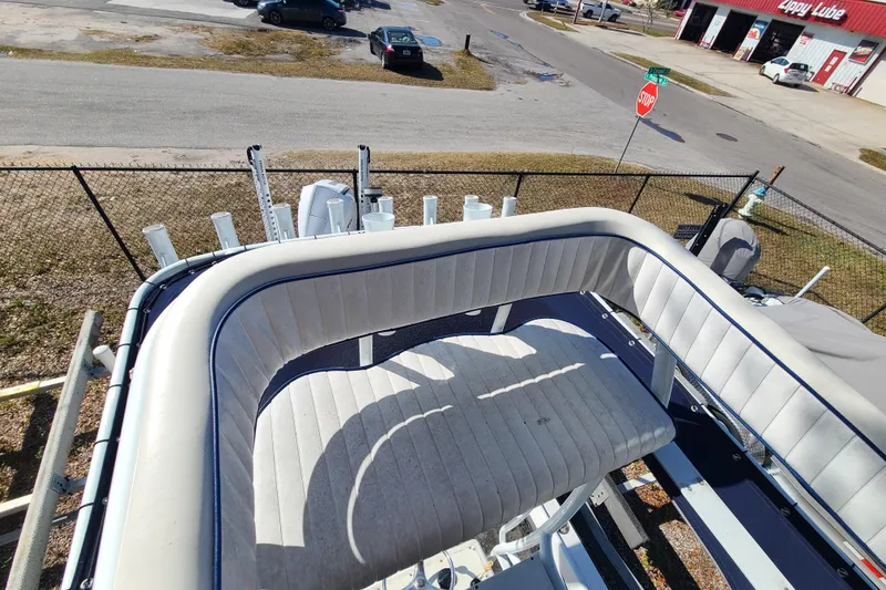 Slide: The Image of 1969 Aquasport 222 Center Console boat interior with white seating, viewed from above. - 13