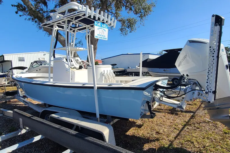 Slide: The Image of 1969 Aquasport 222 Center Console boat for sale on trailer, sunny day. - 20
