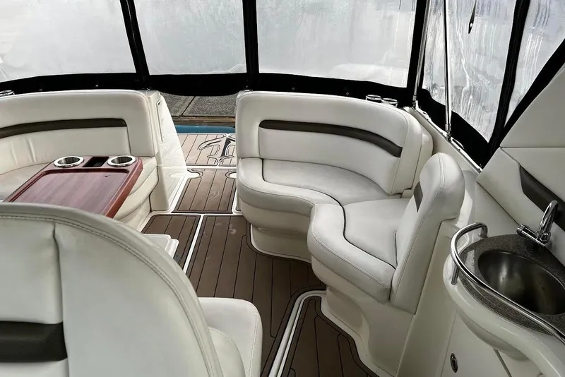 Slide: The Image of Luxurious interior of 2007 Sea Ray 38 Sundancer yacht with plush seating and elegant wood accents. - 16