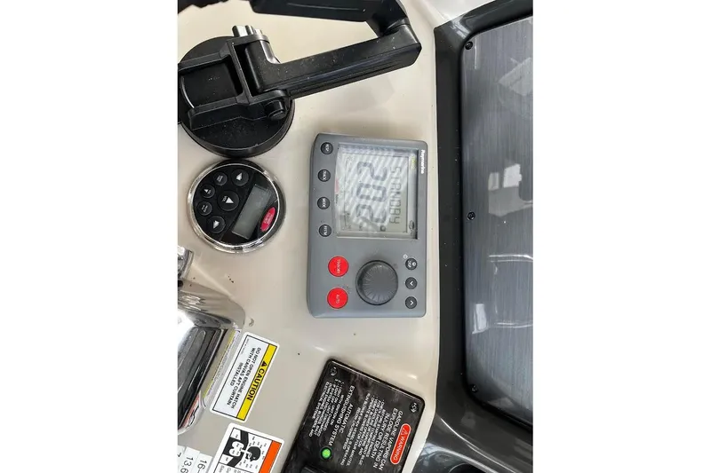 Slide: The Image of Control panel of a 2007 Sea Ray 38 Sundancer boat with navigation instruments. - 19