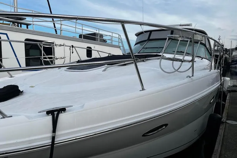 Slide: The Image of 2007 Sea Ray 38 Sundancer yacht docked at marina, showcasing sleek design and modern features. - 21